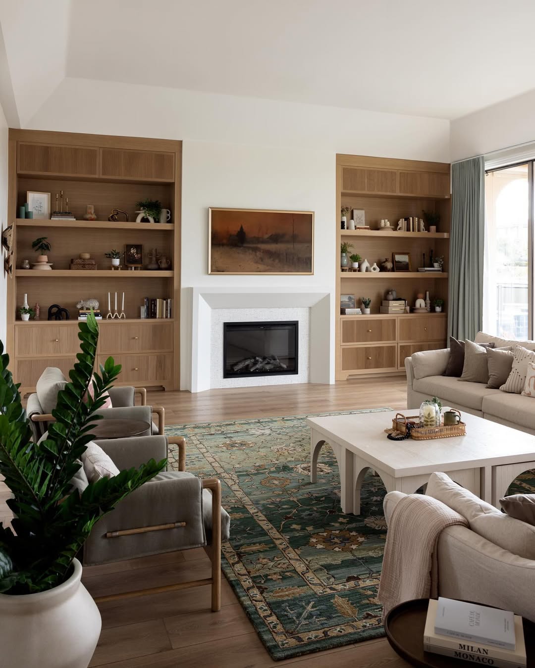 Living Room with Green Rug - Round rug under round table