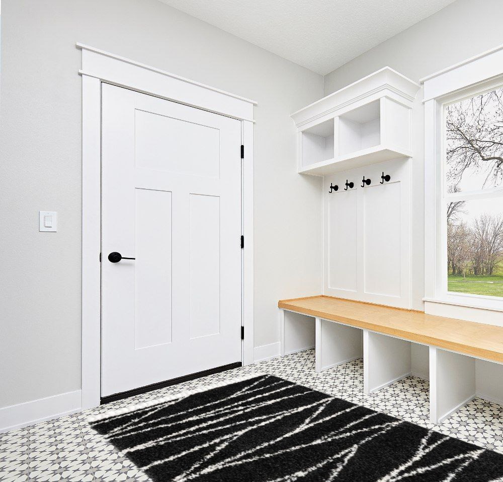 Abrahams Geometric Black/White Area Rug Hashtag Home Rug Size: Rectangle 5'3" x 8' in White Modern Entryway