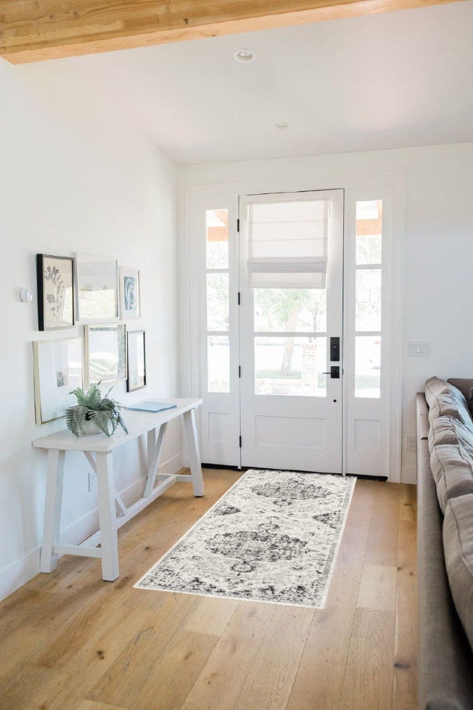 Odelia Vintage Bohemian Area Rug in White Scandinavian Entryway