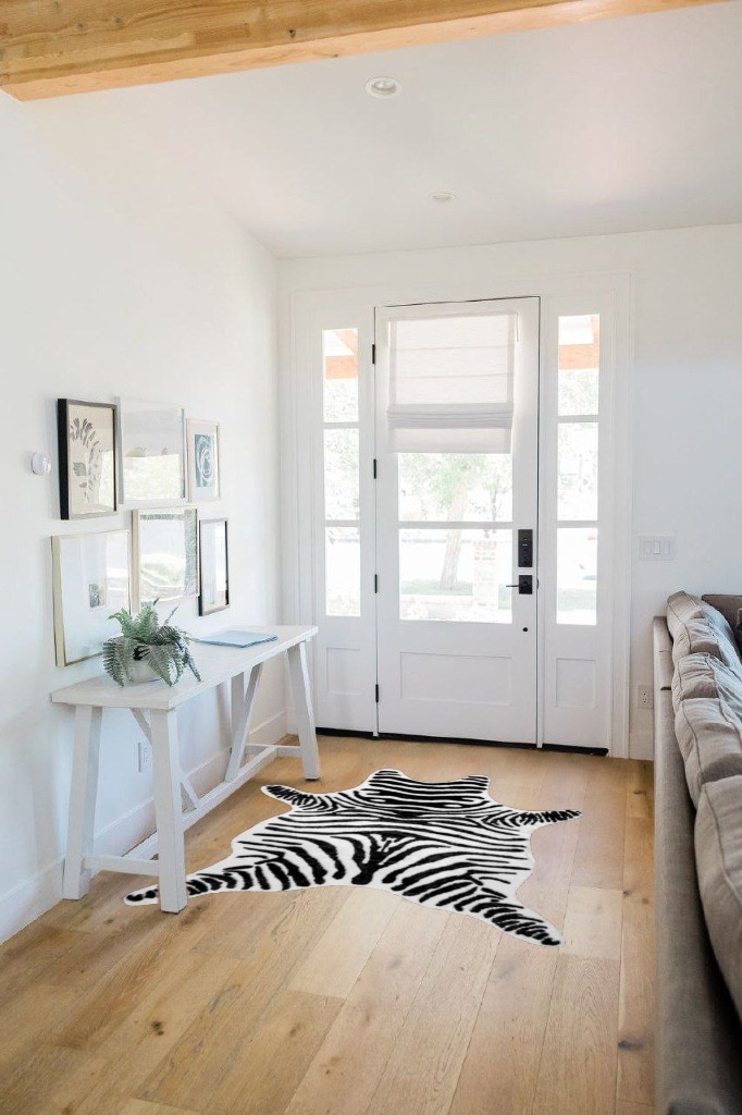 nuLOOM Jayla Machine Washable Zebra Faux Cowhide Accent Rug, 3' 10" x 5', Black and White in White Scandinavian Entryway
