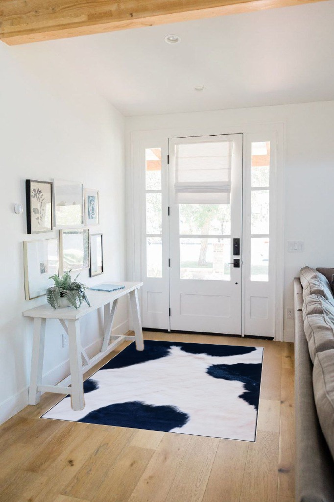 Safavieh Faux Hide Collection Accent Rug - 4' x 6', Ivory & Dark Blue, Non-Shedding & Easy Care, Machine Washable Ideal for High Traffic Areas in Entryway, Living Room, Bedroom (FAH548A) in White Scandinavian Entryway