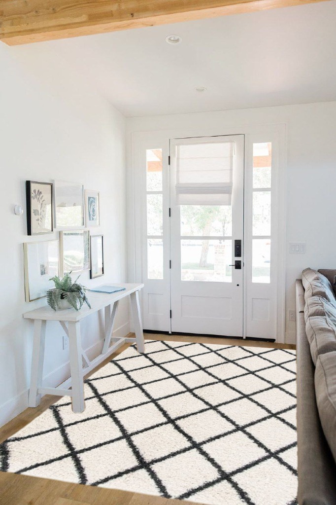 Marrone Geometric Ivory/Black Area Rug George Oliver Rug Size: Rectangle 5'1" x 7'6" in White Scandinavian Entryway