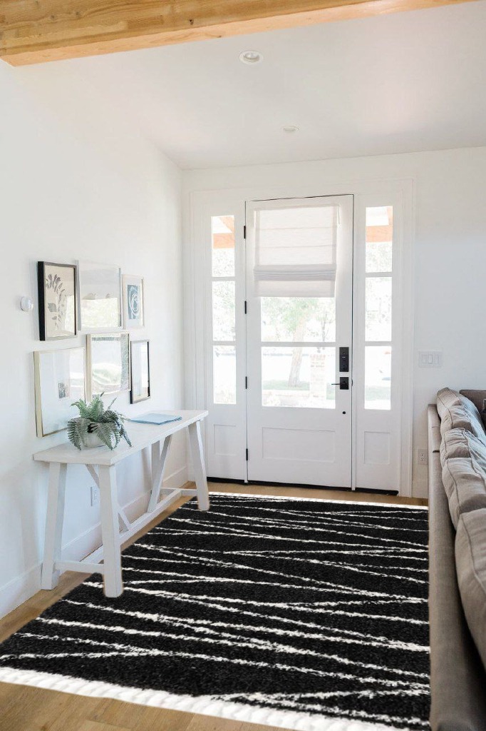 Abrahams Geometric Black/White Area Rug Hashtag Home Rug Size: Rectangle 5'3" x 8' in White Scandinavian Entryway