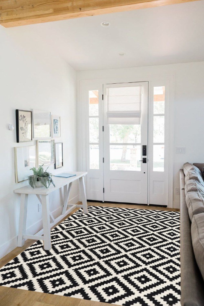 nuLOOM Kellee Hand Tufted Geometric Wool Area Rug, 5x8, Black in White Scandinavian Entryway