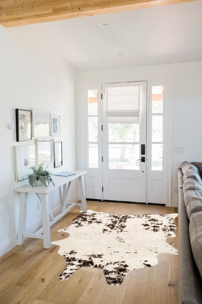 nuLOOM Marcia Machine Washable Faux Cowhide Area Rug, 5' x 6' 7", Brown in White Scandinavian Entryway