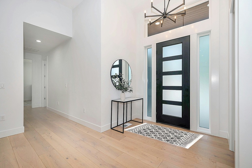 nuLOOM Ansley Moroccan Lattice Tassel Area Rug in Modern White Entryway