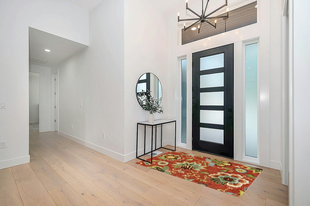 Lahome Red Washable Area Rugs in Modern White Entryway
