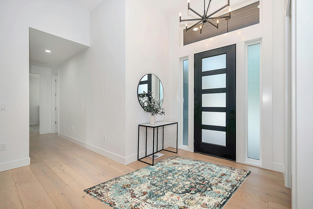 Bohemian Floral Medallion Area Rug in Modern White Entryway