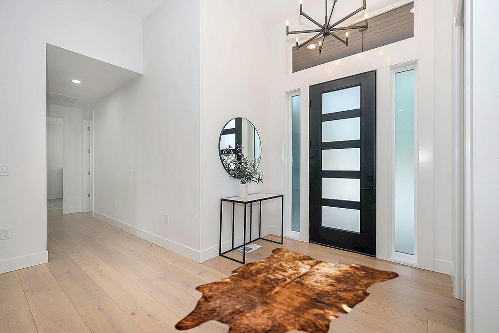 NativeSkins Brindle Faux Cowhide Rug - Sahara Sands (4.6ft x 6.6ft) - Cow Print Area Rug for a Western Boho Decor - Synthetic, Cruelty-Free Animal Hide Carpet with No-Slip Backing, Cow Print Rug in Modern White Entryway