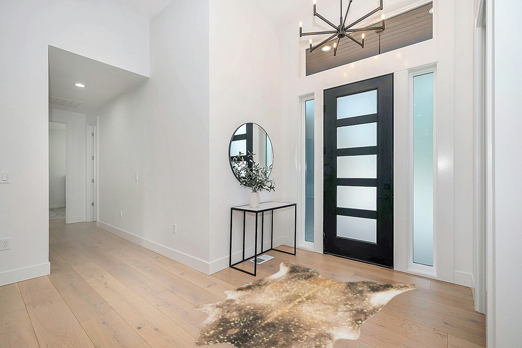 Loloi II Odessa Collection ODE-01 Mocha/Sand 5' x 6'-6" Area Rug in Modern White Entryway