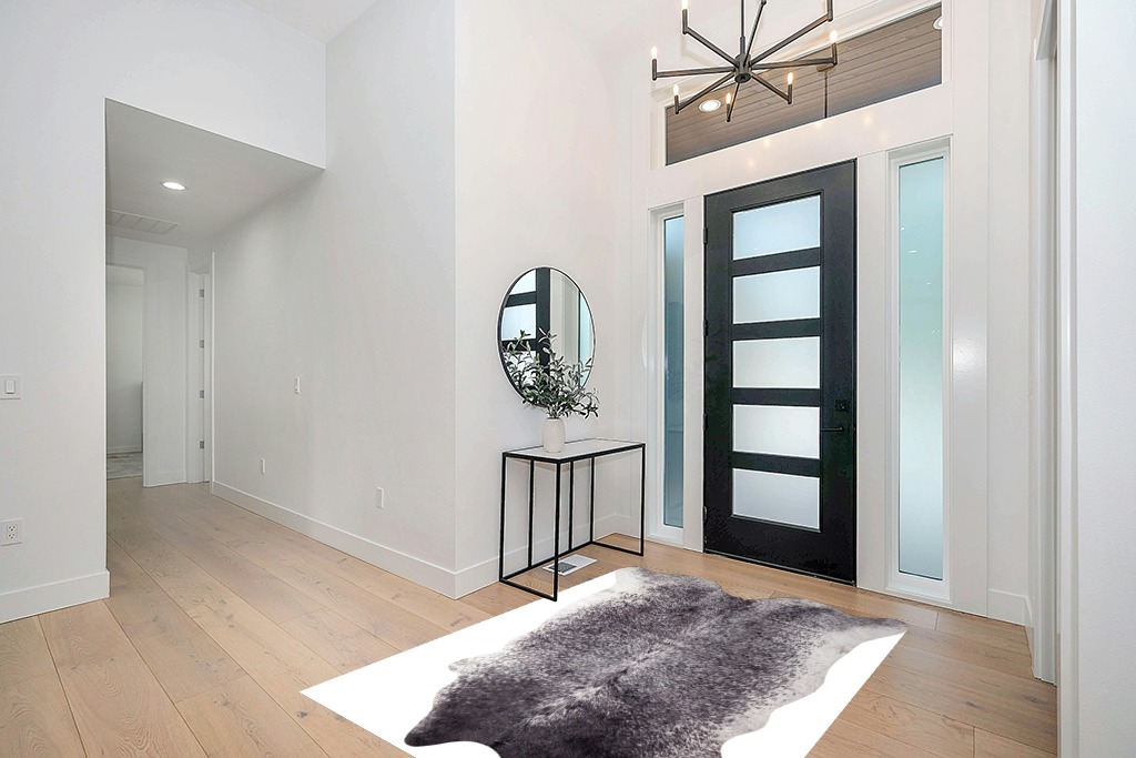 Faux Cowhide Printed (Hairless) Rug 5ft x 6.5ft, Black and White Brindle in Modern White Entryway