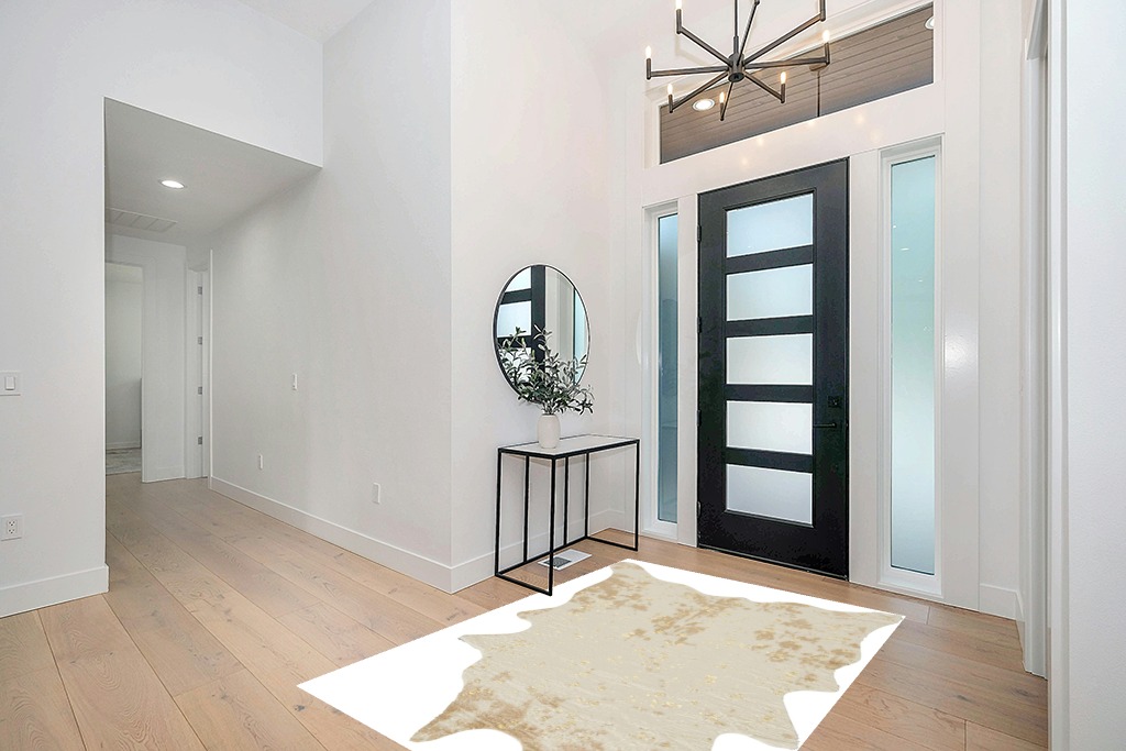 Signature Design by Ashley Jaxith Farmhouse 5 x 7 Medium Pile Cowhide Rug, Ivory & Tan in Modern White Entryway
