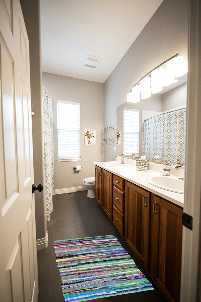 Various Colors Bohemian Non Slip Area Rug in Wooden and Grey Bathroom