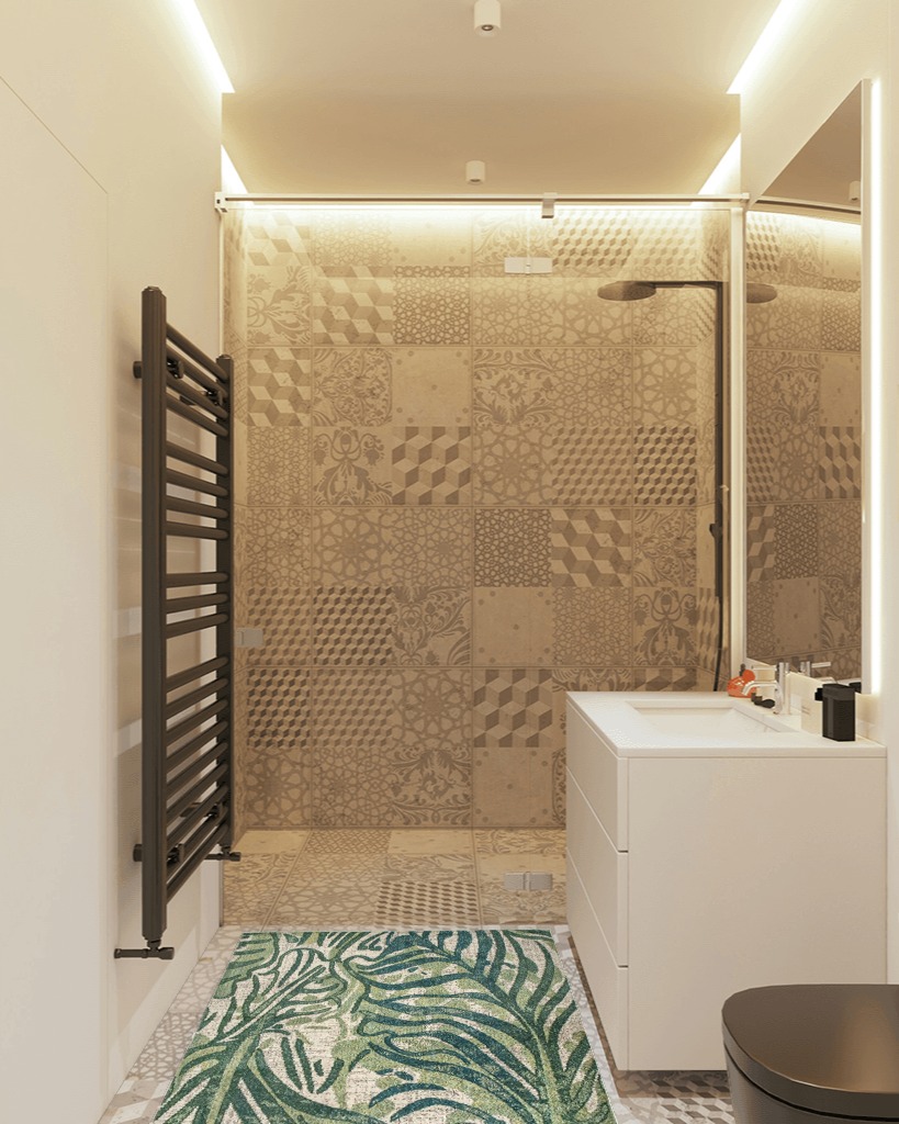 nuLOOM Cali Abstract Leaves Area Rug in White Tiled Bathroom