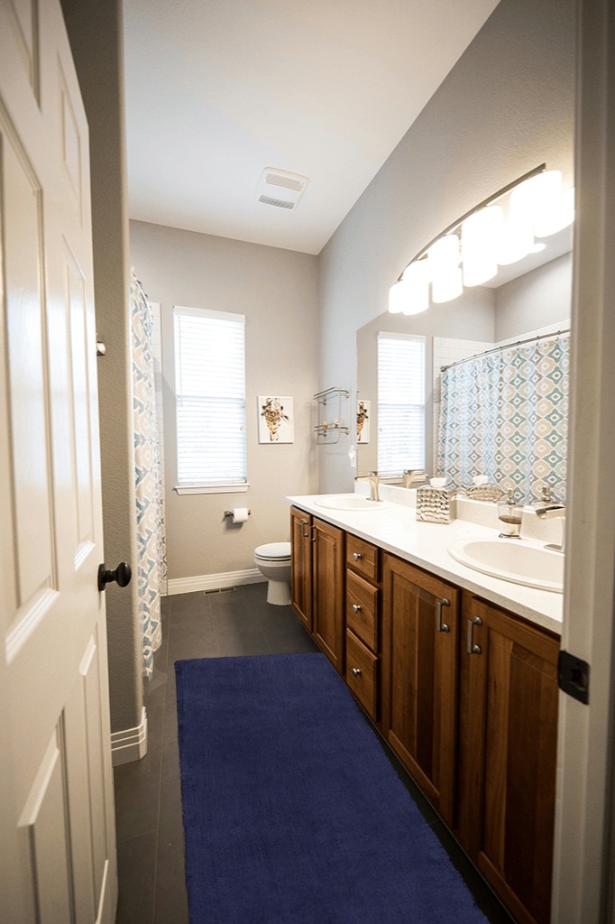 Ultra Soft Faux Living Room Rug in Wooden and Grey Bathroom
