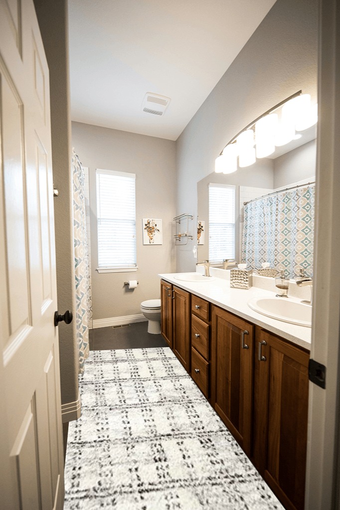 Loloi II Bliss Shag Cream/Grey 2'-7" x 7'-6" Runner Rug in Wooden and Grey Bathroom