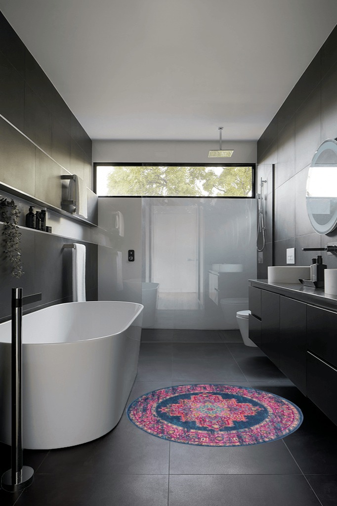 HomeRoots 4' Blue Round Power Loom Area Rug in Black Modern Bathroom