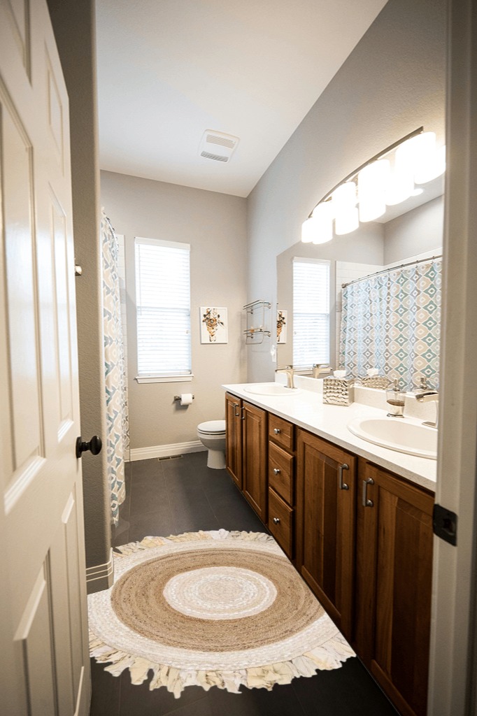 Highland Dunes Jaziel Handwoven Beige/Natural Area Rug, Size: Round 4' in Wooden and Grey Bathroom