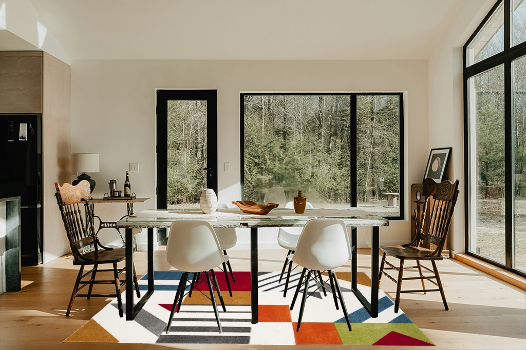 SAFAVIEH Hollywood Collection Area Rug - 5'3" x 7'6", Ivory & Peacock Blue, Mid-Century Modern Design, Non-Shedding & Easy Care, Ideal for High Traffic Areas in Living Room, Bedroom (HLW709B) in Modern Scandinavian Dining Room with Black Accents