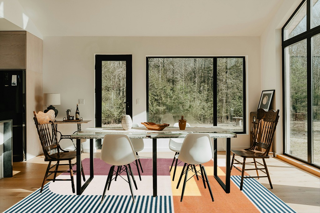 SAFAVIEH Orwell Collection Area Rug - 8' x 10', Rust & Yellow, Mid-Century Modern Abstract Design, Non-Shedding & Easy Care, Ideal for High Traffic Areas in Living Room, Bedroom (ORW368P) in Modern Scandinavian Dining Room with Black Accents