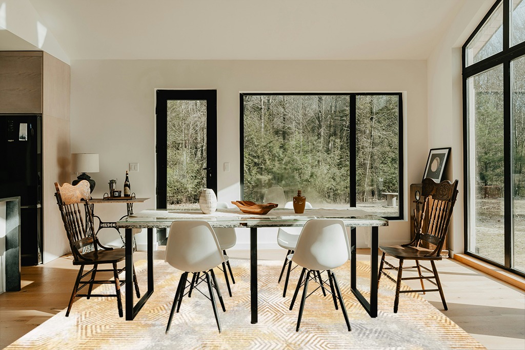 Art&Tuft Washable Rug in Modern Scandinavian Dining Room with Black Accents