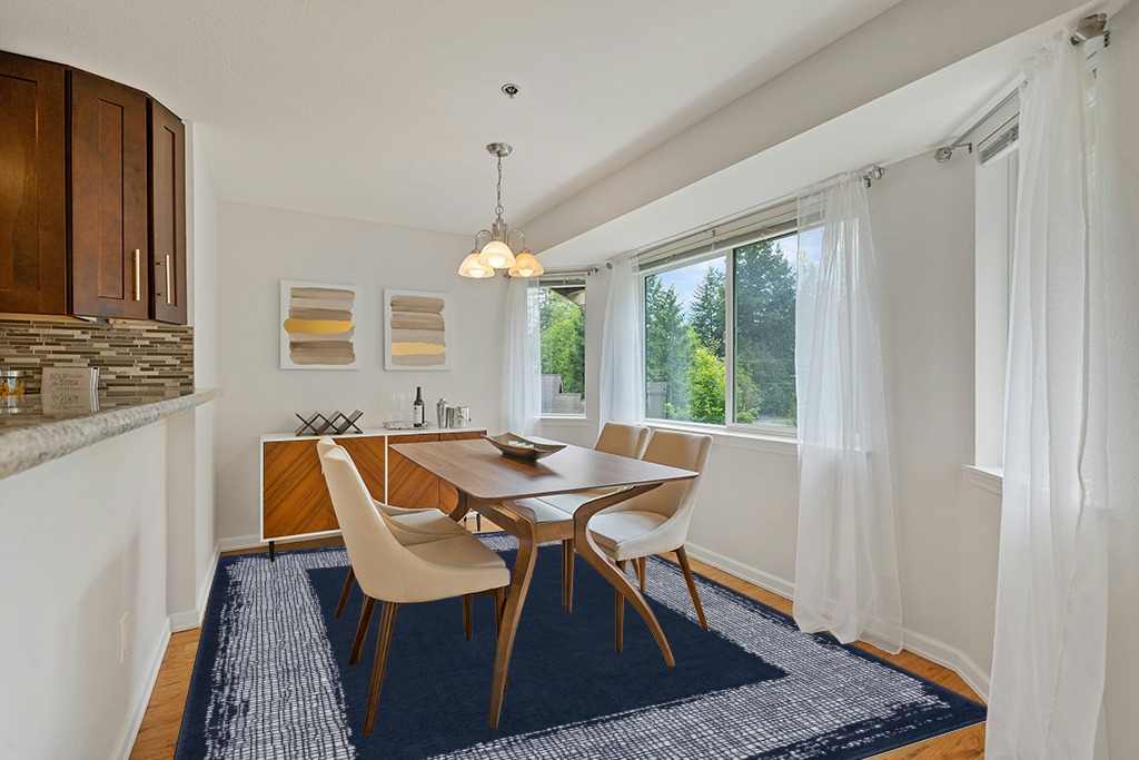 CAMILSON Navy Blue Area Rug 7'10" x 10', Easy-Cleaning Non-Shedding, Bordered for Living Room, Bedroom, Dining Room Navy Blue/Cream Indoor Area Rugs (8x10) in Modern White Dining Room with Wooden Accents
