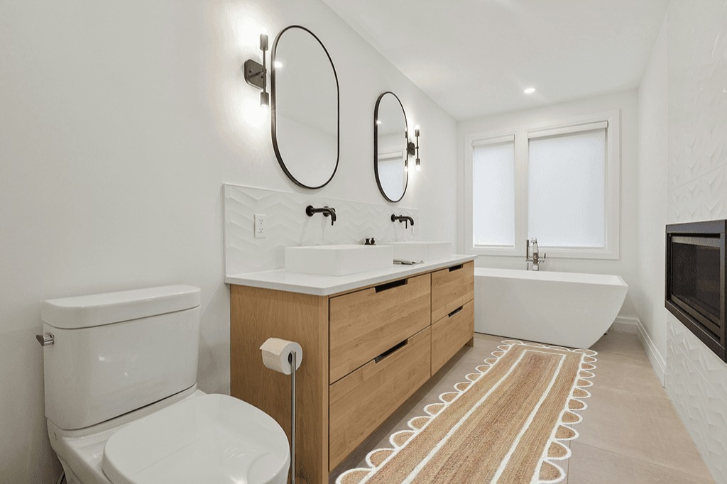 Weaving Village Scalloped Natural Jute Area Rug, Natural Base Off White Trim, 2'6"x12' in Scandinavian Neutral bathroom