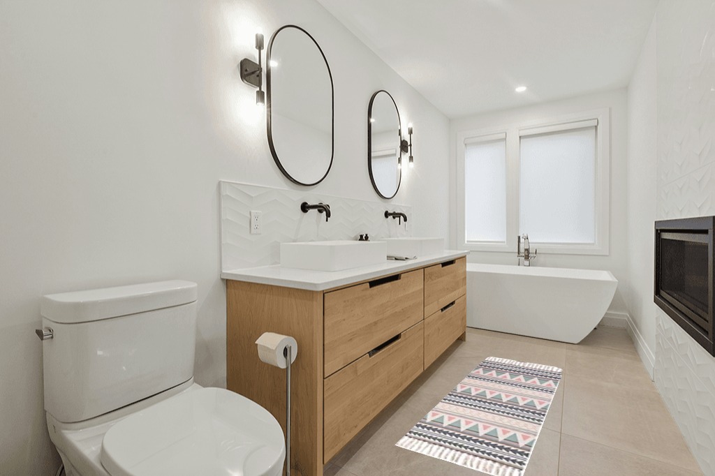 Poowe Cotton Woven Tassles Area Rug in Scandinavian Neutral bathroom