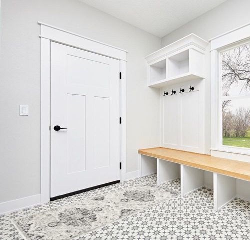 Odelia Vintage Bohemian Area Rug in White Modern Entryway