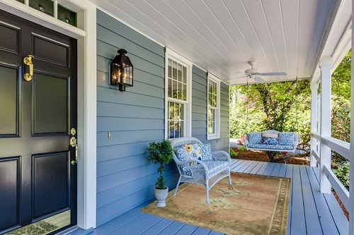 Magnolia Home by Joanna Gaines x Loloi Sinclair SIN-06 Collection Machine Washable Clay / Tobacco 5'-0" x 7'-0" Area Rug in Light Blue Patio