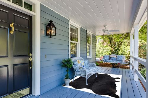 Gaucho Cowhides Solid Black Cowhide Rug - Natural Product in Light Blue Patio