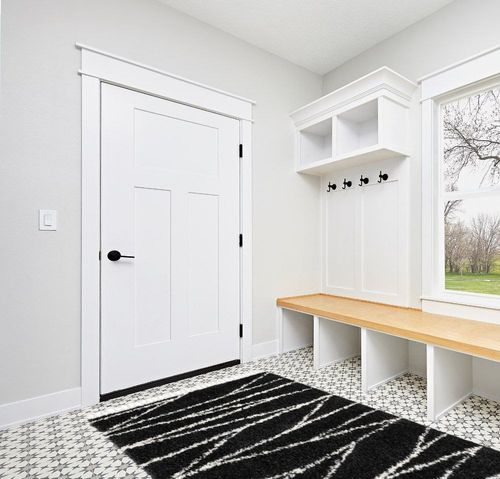 Abrahams Geometric Black/White Area Rug Hashtag Home Rug Size: Rectangle 5'3" x 8' in White Modern Entryway