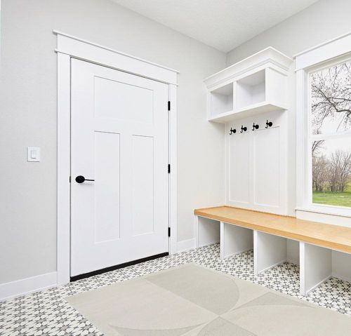 Mensa Cream Modern Geometric Area Rug Wade Logan Rug Size: Rectangle 5'3" x 7' in White Modern Entryway