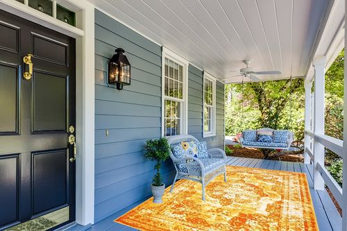 Unique Loom Sofia Collection Area Rug - Salle Garnier (6' 1" x 9' Rectangle, Orange/ Yellow) in Light Blue Patio