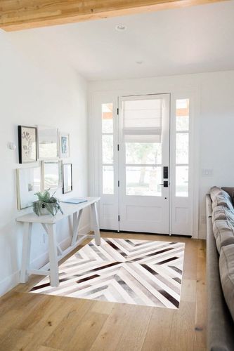 Safavieh Studio Leather Collection Accent Rug - 4' x 6', Grey & Brown, Handmade Modern Natural Hide, Ideal for High Traffic Areas in Entryway, Living Room, Bedroom (STL819F) in White Scandinavian Entryway