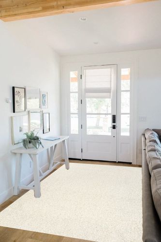 nuLOOM Marlow Machine Washable Soft Shaggy Faux Sheepskin Area Rug, 5x8, White in White Scandinavian Entryway