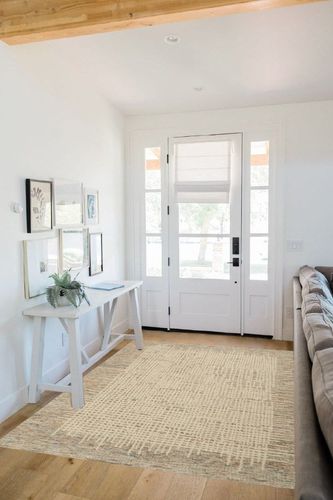 Tufted Wool Beige Area Rug Dovecove Rug Size: Rectangle 5'3" x 7'3" in White Scandinavian Entryway