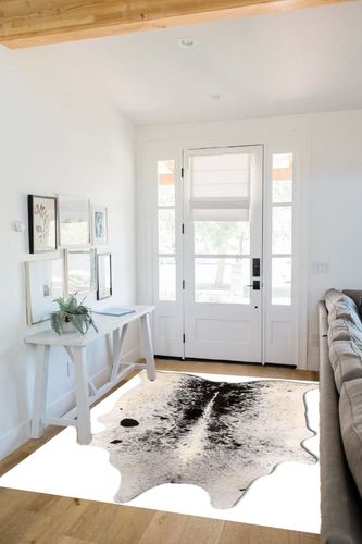 Cowhide Area Rug in White Scandinavian Entryway
