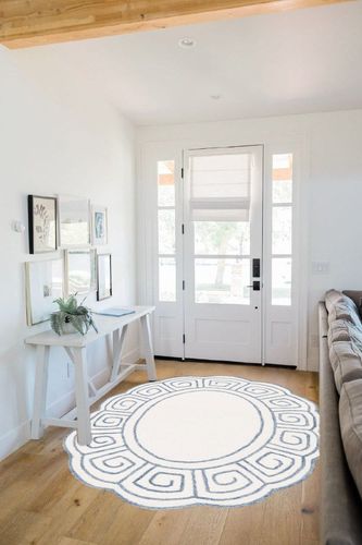 SAFAVIEH Novelty Collection Area Rug - 4'6" x 6'6" Oval, Ivory & Blue, Handmade Wool, Greek Key Border Design, Ideal for High Traffic Areas in Living Room, Bedroom, Dining (NOV109A-4OV) in White Scandinavian Entryway