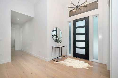 NuLOOM Iraida Contemporary Faux Cowhide Area Rug, 3' 10" x 5', Off-white in Modern White Entryway