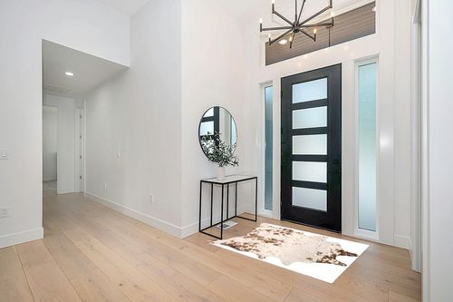 nuLOOM Iraida Contemporary Faux Cowhide Area Rug, 3' 10" x 5', Brown in Modern White Entryway