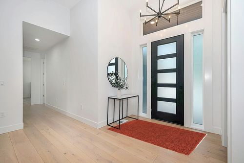 Unique Loom Solid Shag Collection Area Rug (4' 1" x 6' 1" Rectangle, Terracotta) in Modern White Entryway