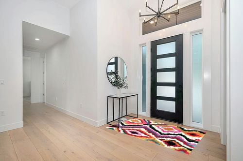 nuLOOM Handmade Carnival Abbey Shaggy Area Rug, 4x6, Multi in Modern White Entryway