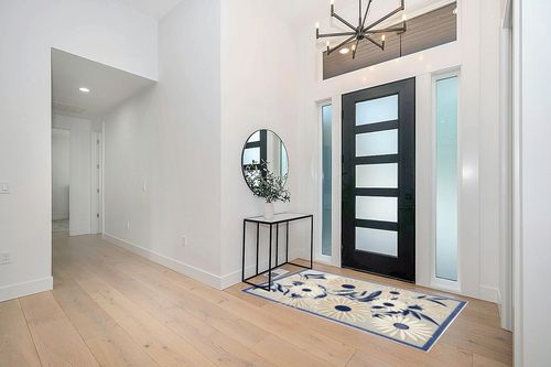 HomeRoots 4' X 6' Blue and Grey Floral Stain Resistant Non Skid Area Rug in Modern White Entryway