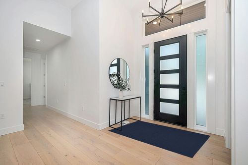 Garland Rug Town Square 4-Feet by 6-Feet Area Rug Navy in Modern White Entryway