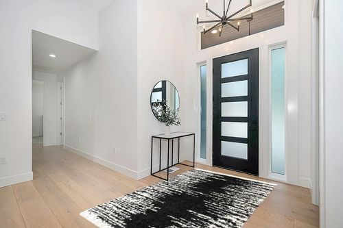 Knupp Abstract Black/White Area Rug Trent Austin Design Rug Size: Rectangle 5'3" x 8' in Modern White Entryway