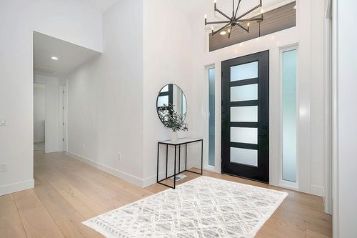nuLOOM Ansley Moroccan Lattice Tassel Area Rug, 5' 3" x 7' 7", Beige in Modern White Entryway