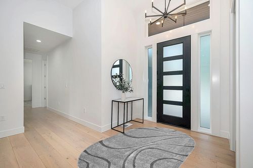 nuLOOM Carolyn Modern Shag Area Rug, 5' x 8' Oval, Dark Grey in Modern White Entryway