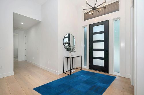 BESPOKY 5'1" x 7'7" (154x230 Cm) Teselya Blue Patchwork Wool Handmade Area Rug in Modern White Entryway