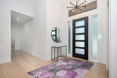 Addison Rugs Chantille ACN556 Red 5' x 7'6 Indoor Outdoor Area Rug, Stain Resistant, Machine Washable, Non Shedding, Bedroom, Living Room, Dining Room, Kitchen Rug in Modern White Entryway